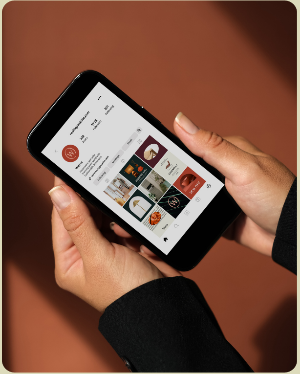 Hand holding a smartphone displaying the Kora workforce app